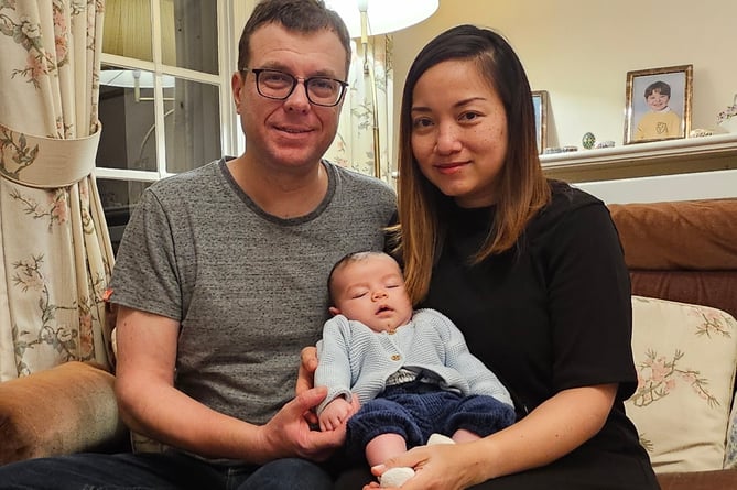 John, Jarmmy and baby Robbie Greenwood. A couple have welcomed a miracle IVF baby after they opted for genetic testing - which is more common in mum's native Thailand. Jarmmy, 39, and John Greenwood, 49, met in Thailand at a wedding anniversary party where John was a guest and Jarmmy was the party planner. They married in 2017 then relocated to the UK and settled in Taunton and were keen to a family straight away. The couple both had fertility issues and bought a two cycle package of IVF at fertility company BCRM in Bristol. 