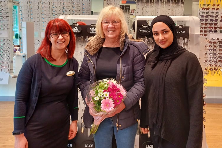 Catherine Simmons (centre) with Minehead Specsavers store manager Rebecca Howe (left) and Nashwa Choudhury, the optician who referred her.