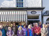 Volunteers celebrate successful first year running village shop