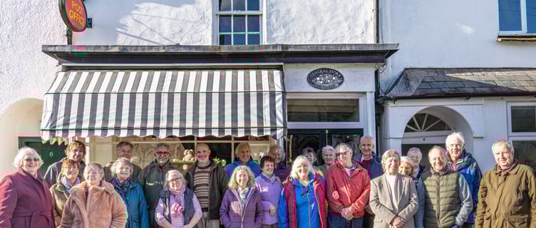 Some of the volunteers who run Stogumber's shop and Post Office after a celebratory cake and tea meeting for their first anniversary.