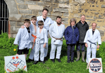 Kilve Chantry surrounded by sea of daffodils after Tsunami Judo Club bulb planting