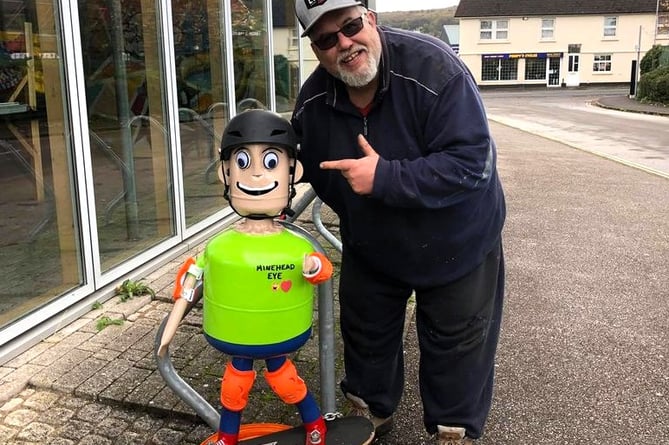 Steven Heard with enthusiastic youngster outside the Minehead Eye