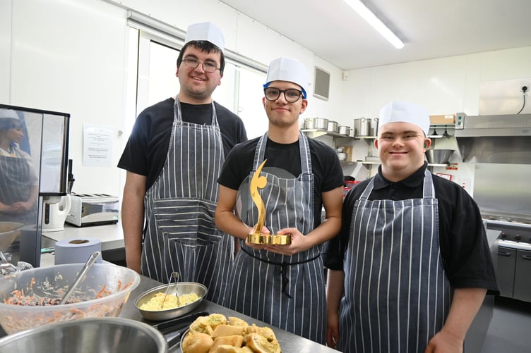 Aurora Foxes Academy students with their community engagement award in Williton.