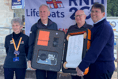 Lifeboat volunteers and supporters sign 200th anniversary scroll