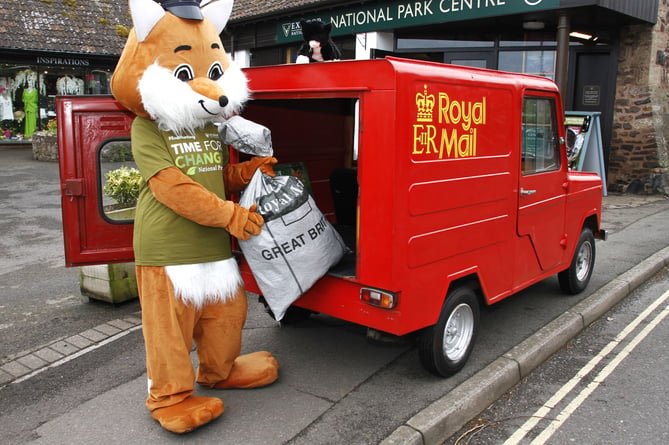A League Against Cruel Sports fox postie delivers some of its 10,000 anti-trail hunting postcards to Exmoor National Park Authority's visitor centre in Dunster. 