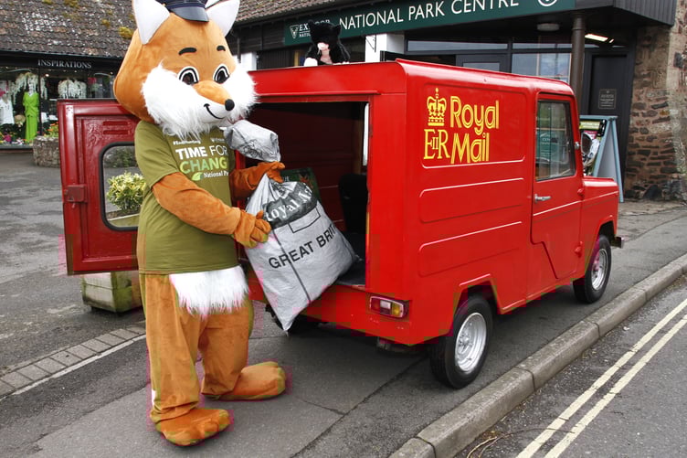 A League Against Cruel Sports fox postie delivers some of its 10,000 anti-trail hunting postcards to Exmoor National Park Authority's visitor centre in Dunster.