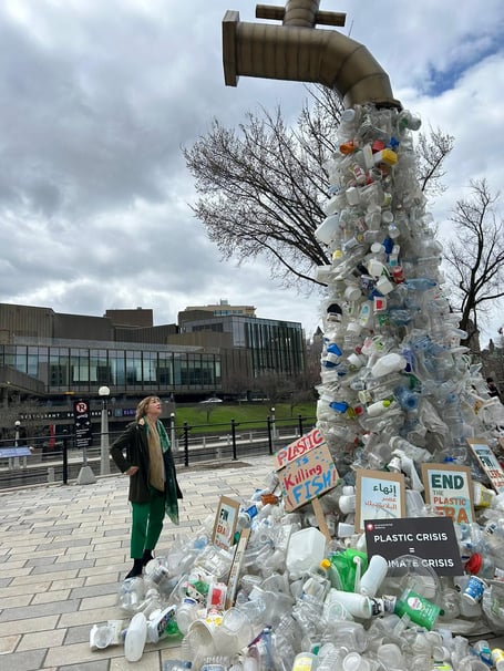 Local MP Rebecca Pow was dwarfed by a monster pile of plastic when she attended talks on an international pollution treaty.