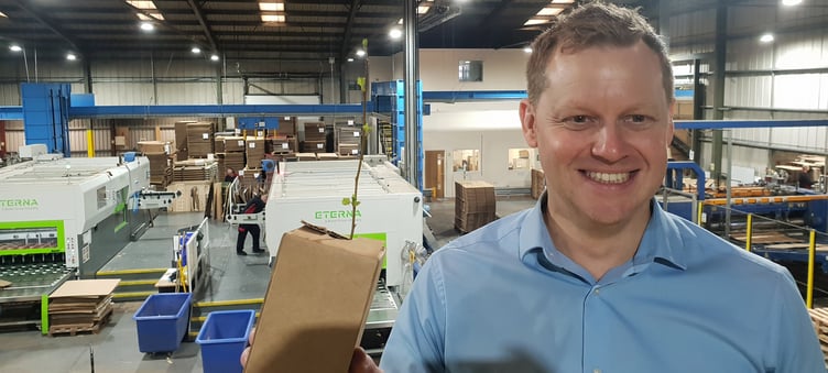 RH Fibreboard sales director Steve Gabell with one his 'tree in a box' specimens which are being used to educate schoolchildren about cardboard.