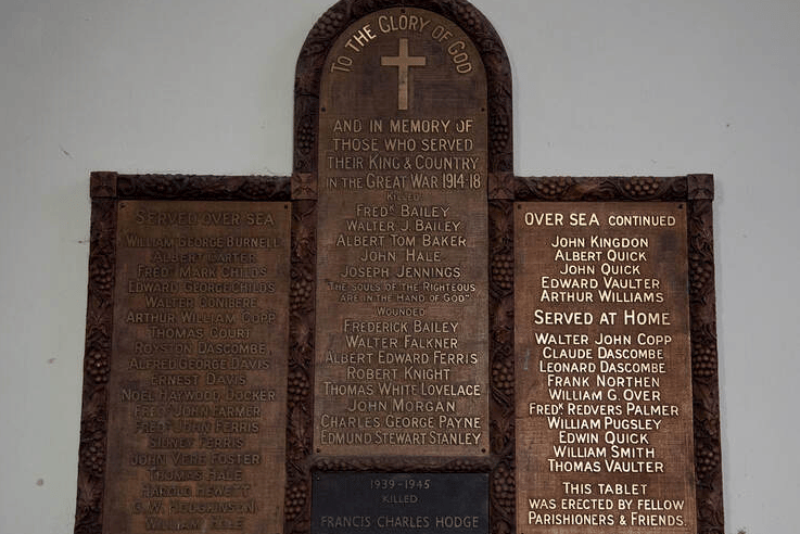 The war memorial plaque in All Saints' Church, Wootton Courtenay.