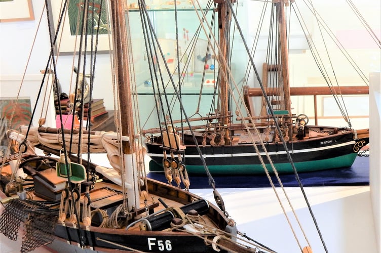 A pair of replica boats made by Tony James
