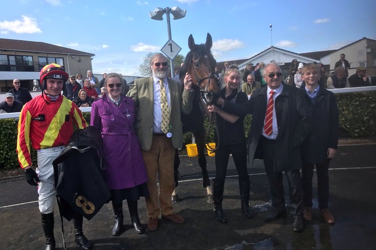 Manuelito in the winners enclosure with jockey Jack Tudor left and Jack Pipe right along with winning connections