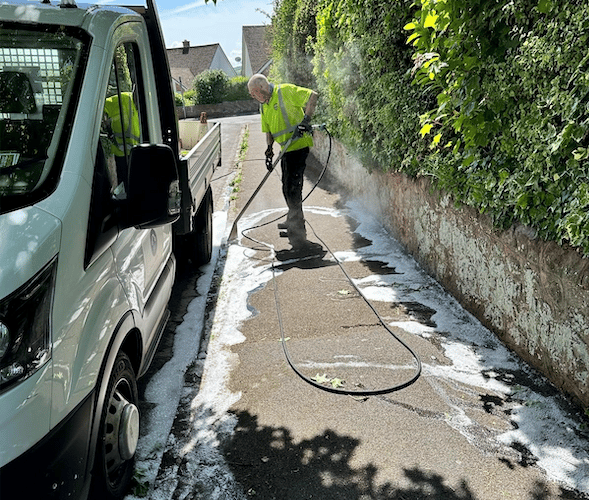 A Minehead Town Council worker applying the Foamstream weedkiller during a six-month trial which has started. 