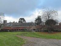 Village's ancient barn needs roof repairs before it collapses