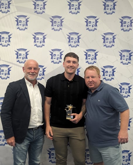 Left to right: Minehead chairman Robbie Hopkins, Manager's Player Ryan Wilkins, and new manager Craig Carr