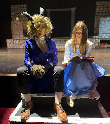 Freddie Jephcott playing the Beast and Eleanor Hecksher is Belle in a West Somerset College production of Beauty and the Beast.