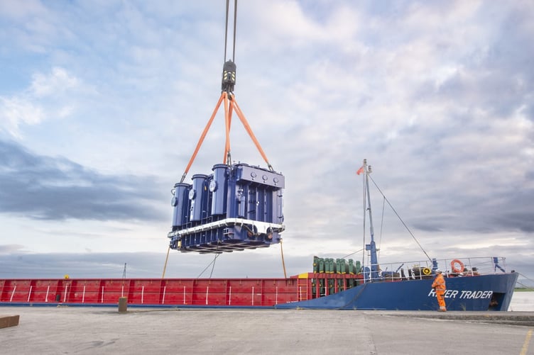The super-grid transformer being offloaded at Dunball Wharf.