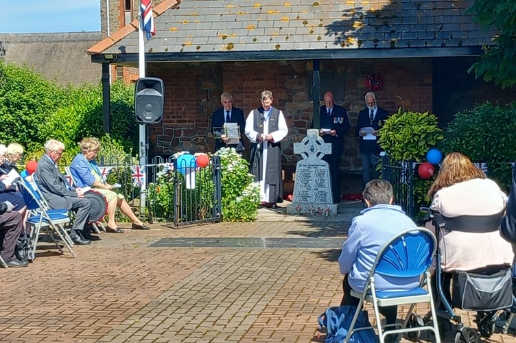 Bishop Nigel Stock leads a D-Day 80th anniversary service at Williton War Memorial.