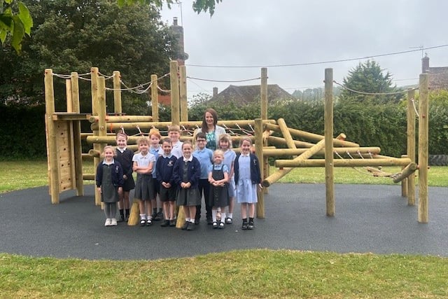Knights Templar School, Watchet, headteacher Laura Weaver with school council pupils and their new playground equipment.