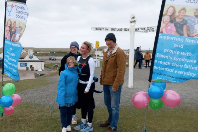 Iris Hammond and her family at the RunAcrossUK finishing line in John O'Groats.