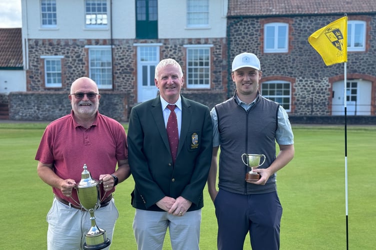 Martin Hole, Men's Captain (centre) presents the Club Championship Trophy to Will Paton (right) and to Ian Gover (left) for the best nett score.