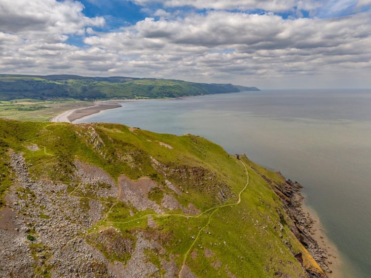 An aerial view of the zigzag descent to the Hurlstone Coastguard Lookout on the rugged section of the South West Coast Path between Minehead and Porlock.