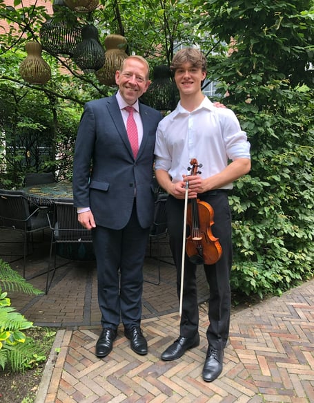 Minehead teenager Anthony Knight with Sofitel Legend The Grand Amsterdam sales and marketing director Kees Hogetoorn.