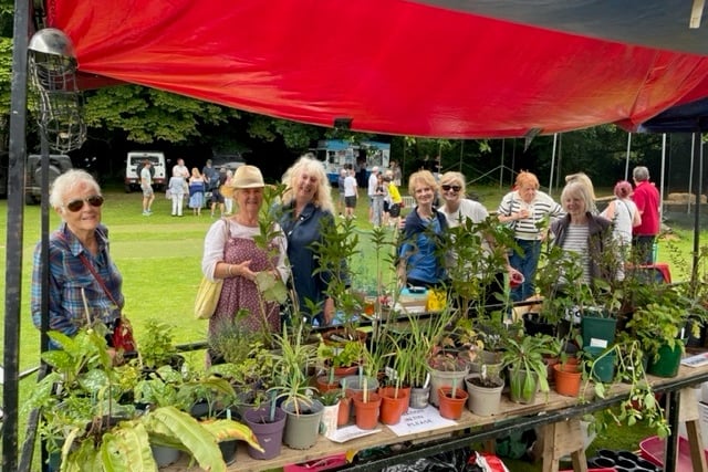 Taking a potter round the pot plants at Roadwater's village fete.