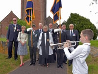 Village sees legion standards laid up
