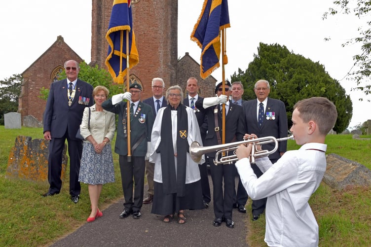 Young bugler Elliott Coles at the laying up of Milverton Royal British Legion's two standards at St Michael's Church.