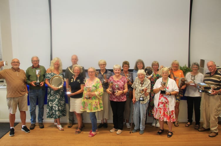 Trophy winners line up at Minehead and District Flower and Produce Show. PHOTO: George Ody.