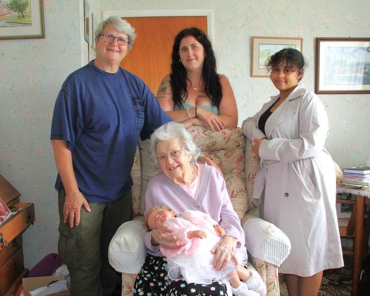 FIVE GENERATIONS: Jean Warrey holds great-great-granddaughter Sarai-Leilani for the first time surrounded by (left to right) her daughter Deb Garbutt, granddaughter Laura Jean, and great-granddaughter Destiny. PHOTO: George Ody.