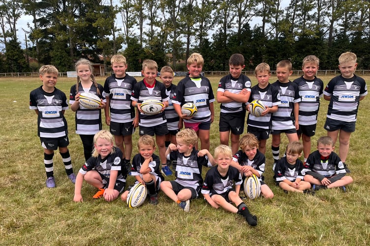 Minehead Barbarians' youngsters, back left to right: Evan Holland, Maizie Lambert, Degan Paige, Sam Blackmore, Jacob Stone, Jasper Cox, Henry Ellicott, Magnus Ellicott, Harry Hewett, Finn Baker, Henry Steer; front: Jack Richards, Henry Cook, Harry Bishop, Archie Cook, Harrison Yiend, Leo Sully & Jason Jeffs