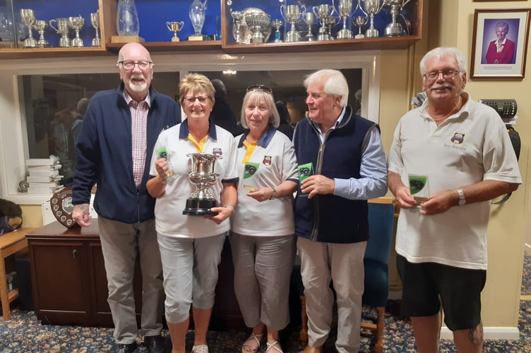 Some players of Mark Palmer's winning team playing in the final evening, left to right (John Munson, Club President awarding the trophy). Shiela Cooper, Janet Richards, Charlie  Cox & Tony Everett