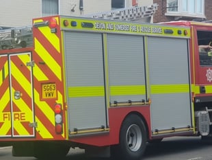Fire crews called to rescue man trapped on roof of building