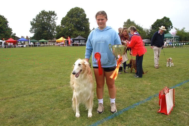 Harriet Benford's borzoi hound Pickle took the top prize in Williton fete's fun dog show.