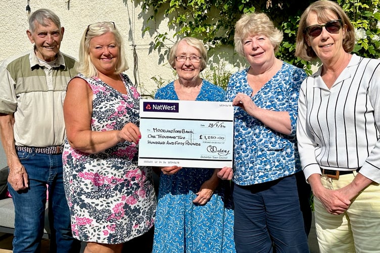 Pictured are (left to right) Chris Nelder, of Visit Dulverton Partnership Group, Dulverton Town Council chairman and partnership member Cllr Christine Dubery, gardener Adele Bain, Moorland Food Bank founder Jenny Barker, and gardener and food bank volunteer Allison Crisp.