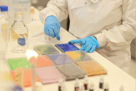 Zoe Snape working in the Singer Instruments laboratory, in Minehead, for her 'Bioart' exhibition for Somerset Art Weeks.