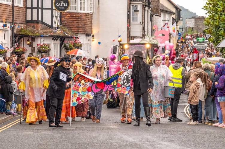 Porlock Ladies' entry 'Love is All Around' makes its way around the village carnival route.
