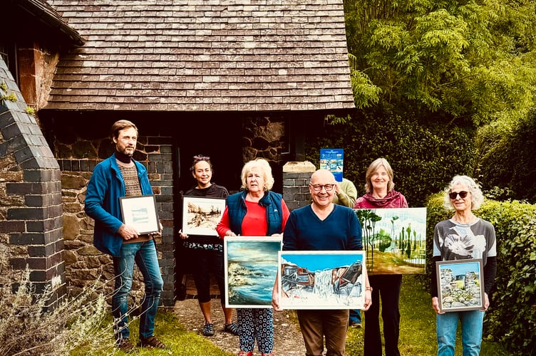 Some of the Porlock Arts Group members who are exhibiting their work in Bossington Methodist Chapel.