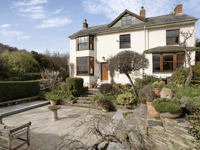 Detached family home with views of Dunster Castle hits the market