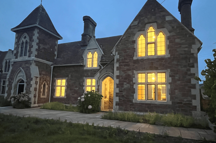 Former police station at Williton pictured at night