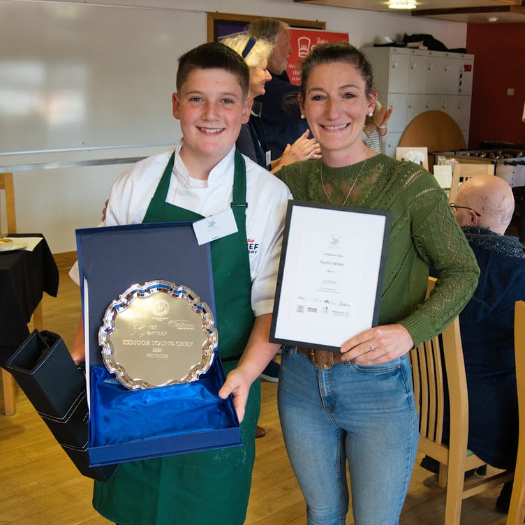 Exmoor Young Chef 2024 winner Austin Elder receives a silver plate and certificate.