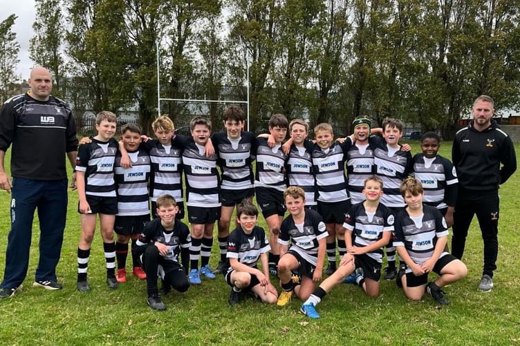 Minehead U12s, back left to right: James Cox (coach), Jack Sewell, Ted Nelder, Harry Parfitt, Lewis Zeitzen, Oscar Cox, Jacob Coles, Owen Sellick, Ben Wyatt, Oliver Bishop, Sam Bradshaw, Justin Mapuranga, Oliver Parfitt (coach).
front: Dylan Paige, Edward Coates, Harry Blackmore, George Tucker, Connor Porter.