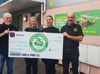 Motor club raises £2,000 for air ambulance charity
