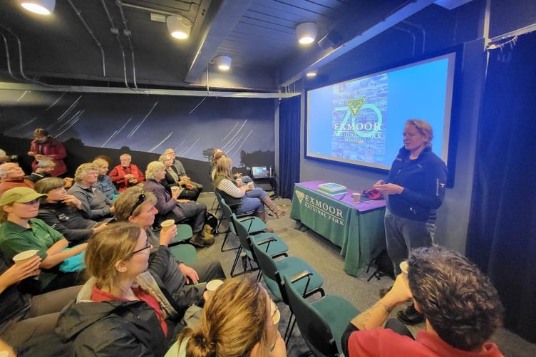 Exmoor National Park staff and volunteers with authority chief executive Sarah Bryan in the National Park Centre, Lynmouth, celebrating 70 years. PHOTO: ENPA.