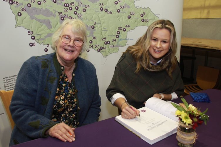 Victoria and Eleanor sign copies of Exmoor Farms: A Year on the Moor (Photo: George Ody)