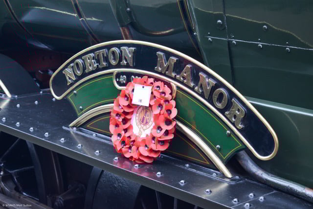 A poppy wreath laid on the temporarily renamed steam locomotive Norton Manor ‘40 Commando’ on the West Somerset Railway line.