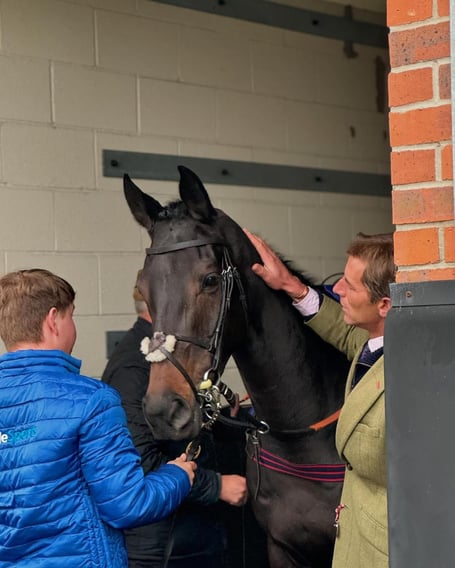 Aintree winner Imperial Saint pictured with Johnson White (right) and Joe Rashleigh who led the horse out.