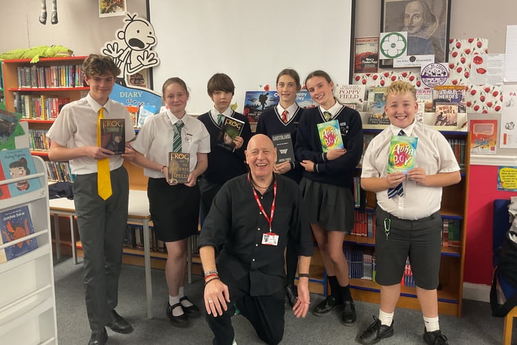 Author Joffre White with some of the pupils he met when he visited Minehead Middle School.
