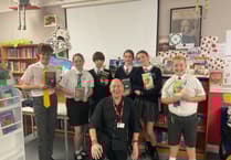 Minehead Middle School pupils quiz author Joffre White about his life